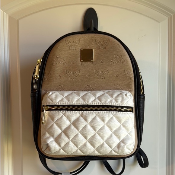 EUC Icing Tan, White, & Black Backpack Purse - Picture 1 of 7